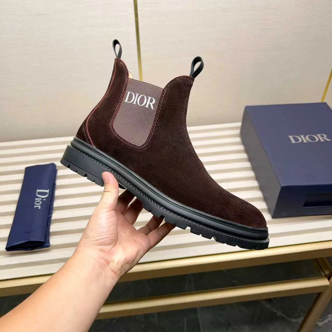 Men's Shoes 💰480 Dior A practical choice that combines protection with classic style. Made from durable Rugged Calf leather, it's tumbled and hand-finished to create a soft suede feel with a rich texture. Elastic side panels and subtle cutouts are inspired by the classic Chelsea boot. Leather upper and lining with Kummel tabs at front and rear, rubber outsole